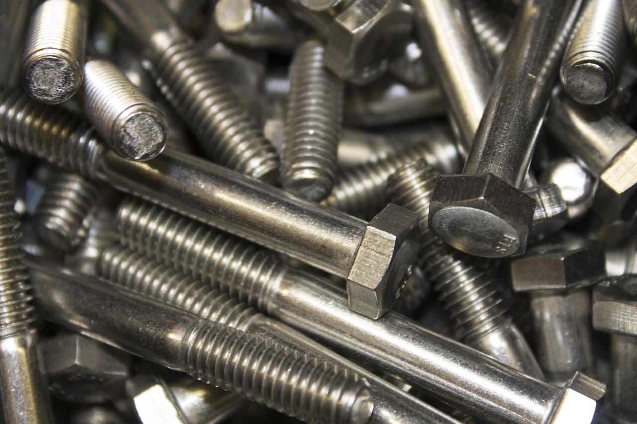 A heap of steel bolts